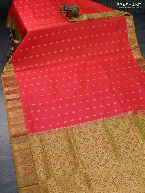 Pure soft silk saree pinkish orange and dual shade of mehendi green with allover zari woven buttas and zari woven border