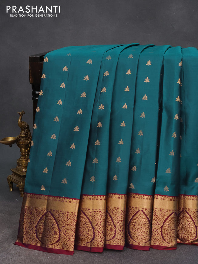 Pure soft silk saree dual shade of peacock green and maroon with allover zari woven buttas and zari woven border