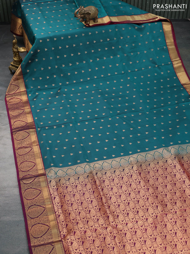 Pure soft silk saree dual shade of peacock green and maroon with allover zari woven buttas and zari woven border