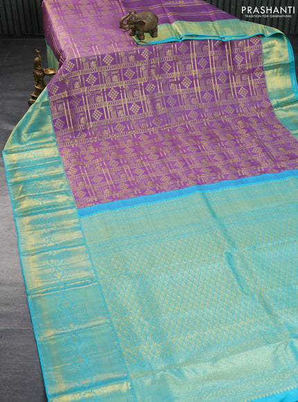 Pure kanchipuram silk saree lavender shade and teal blue with allover zari woven brocade weaves and long rich zari woven border - aari work blouse