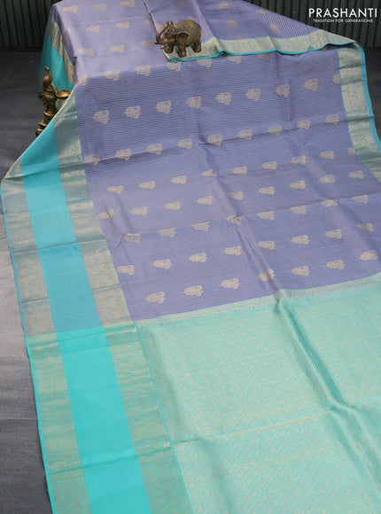 Pure kanchipuram silk saree grey and teal blue with allover zari weaves & buttas and long rettapet zari woven border - aari work blouse