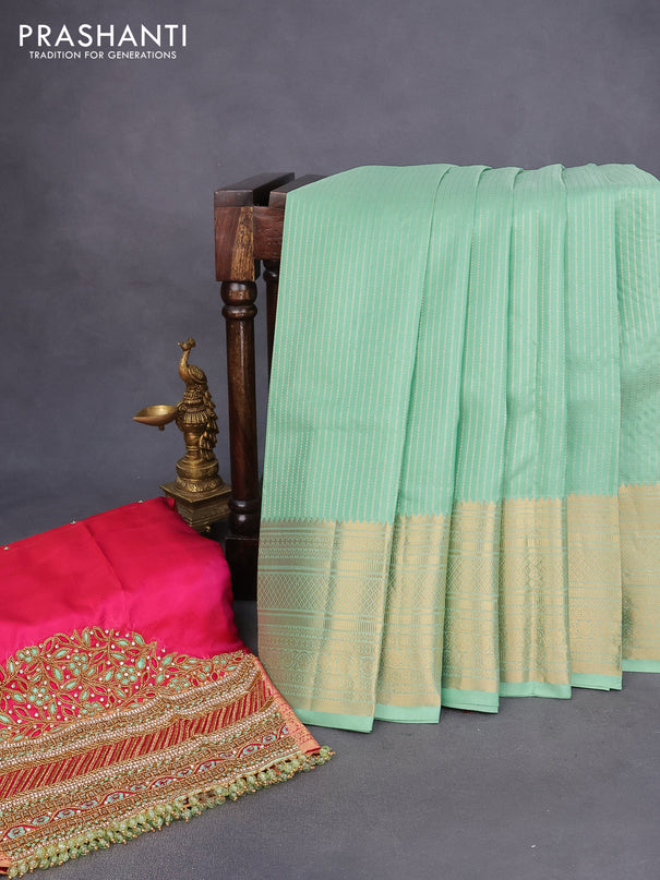 Pure kanchipuram silk saree pastel green and pink with allover zari stripe pattern and rich zari woven border - aari work blouse