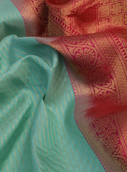 Pure kanchipuram silk saree pastel green and pink with allover zari stripe pattern and rich zari woven border - aari work blouse