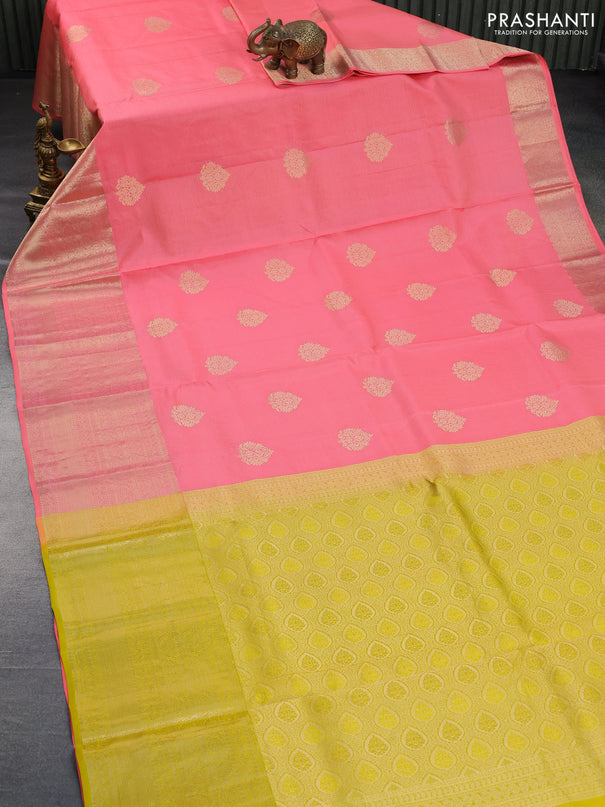 Pure kanchipuram silk saree peach shade and yellow with allover zari stripe & buttas and long rich zari woven border - aari work blouse