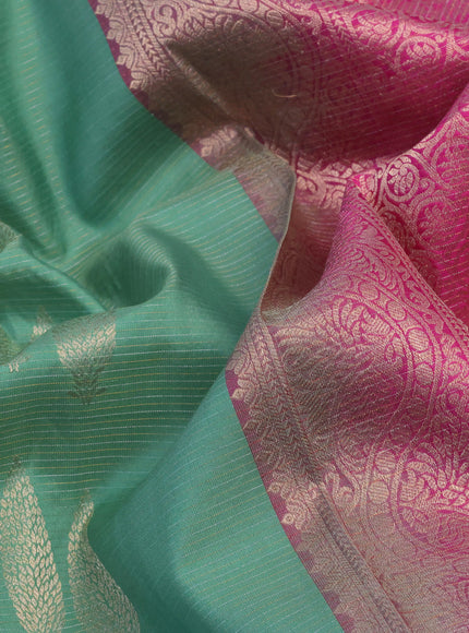 Pure kanchipuram silk saree pastel green and pink with allover zari weaves & buttas and rich zari woven border - aari work blouse