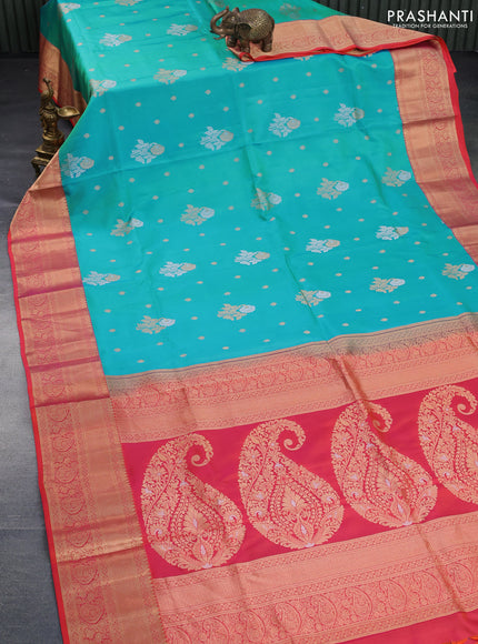 Pure kanchipuram silk saree dual shade of teal blue and dual shade of orange with zari woven buttas and rich zari woven border - aari work blouse