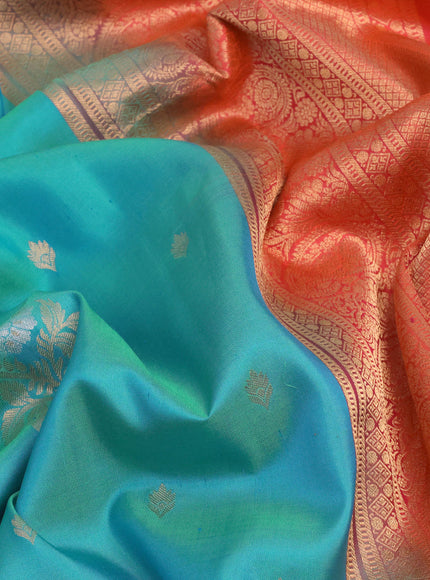 Pure kanchipuram silk saree dual shade of teal blue and dual shade of orange with zari woven buttas and rich zari woven border - aari work blouse