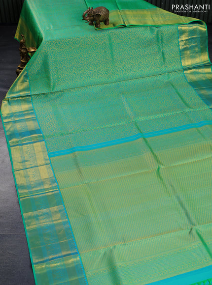 Pure kanchipuram silk saree teal green shade with allover zari woven brocade weaves and rich zari woven border - aari work blouse