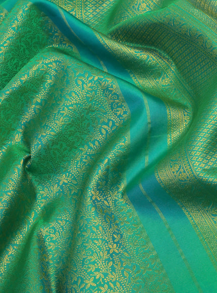 Pure kanchipuram silk saree teal green shade with allover zari woven brocade weaves and rich zari woven border - aari work blouse