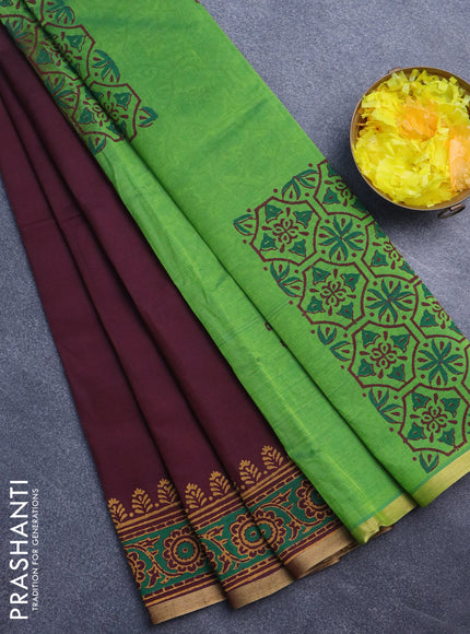 Silk cotton block printed saree deep maroon and light green with floral butta prints and zari woven piping border