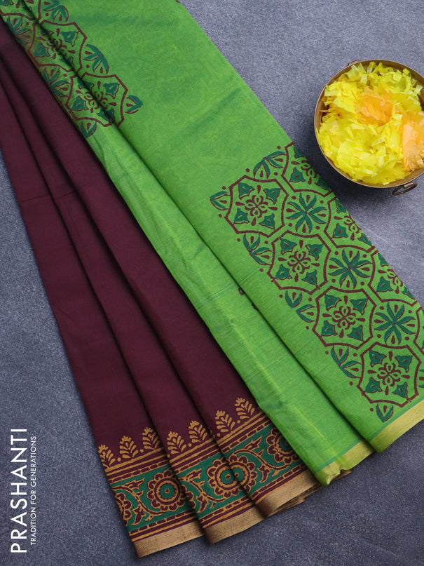 Silk cotton block printed saree deep maroon and light green with floral butta prints and zari woven piping border