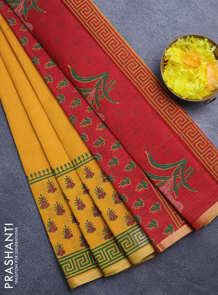 Silk cotton block printed saree mango yellow and maroon with plain body and zari woven piping border