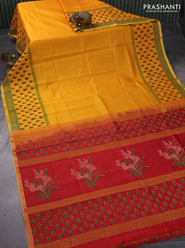 Silk cotton block printed saree mango yellow and maroon with plain body and zari woven piping border