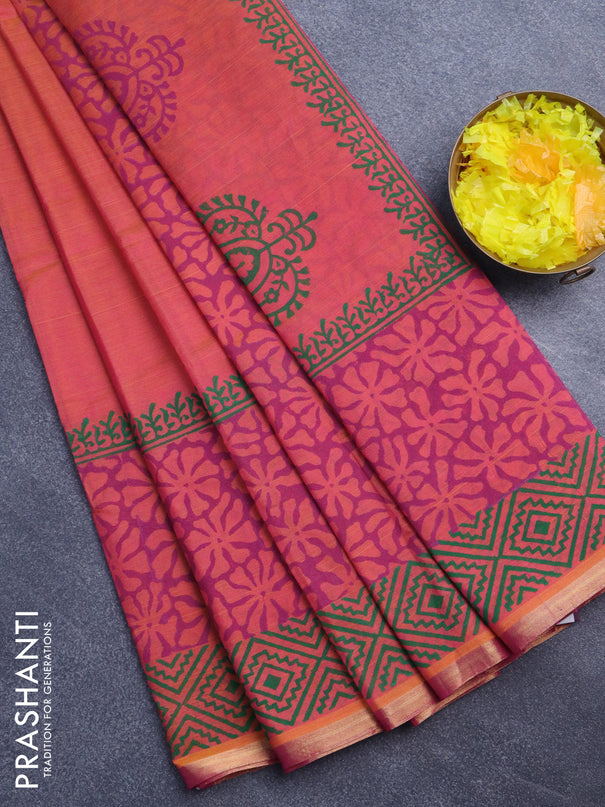 Silk cotton block printed saree dual shade of pinkish orange with floral butta prints and zari woven piping border