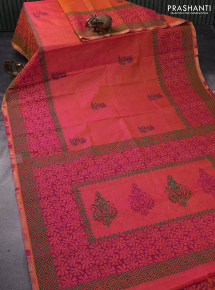 Silk cotton block printed saree dual shade of pinkish orange with floral butta prints and zari woven piping border