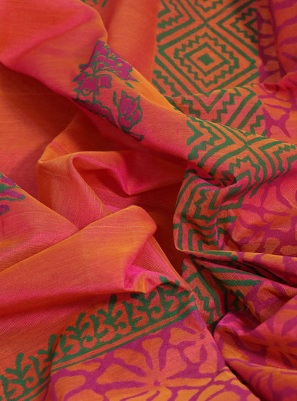 Silk cotton block printed saree dual shade of pinkish orange with floral butta prints and zari woven piping border