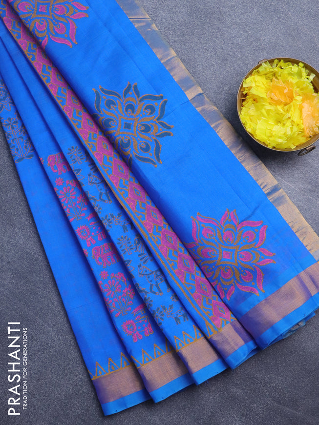 Silk cotton block printed saree blue with allover prints and zari woven border