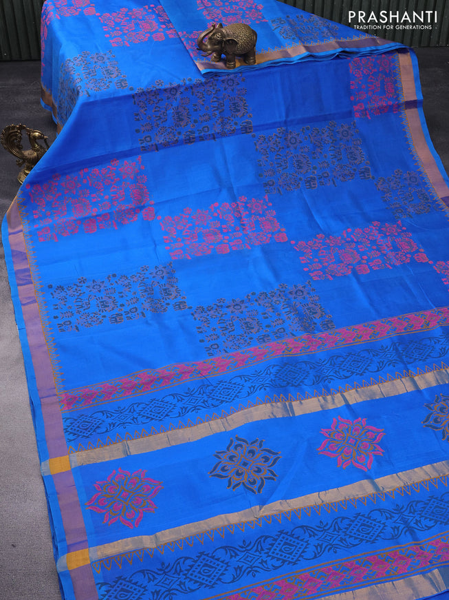 Silk cotton block printed saree blue with allover prints and zari woven border