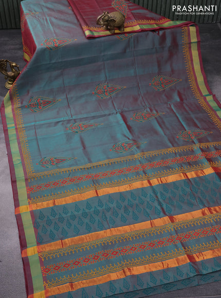 Silk cotton block printed saree dual shade of teal greenish maroon with butta prints and zari woven border