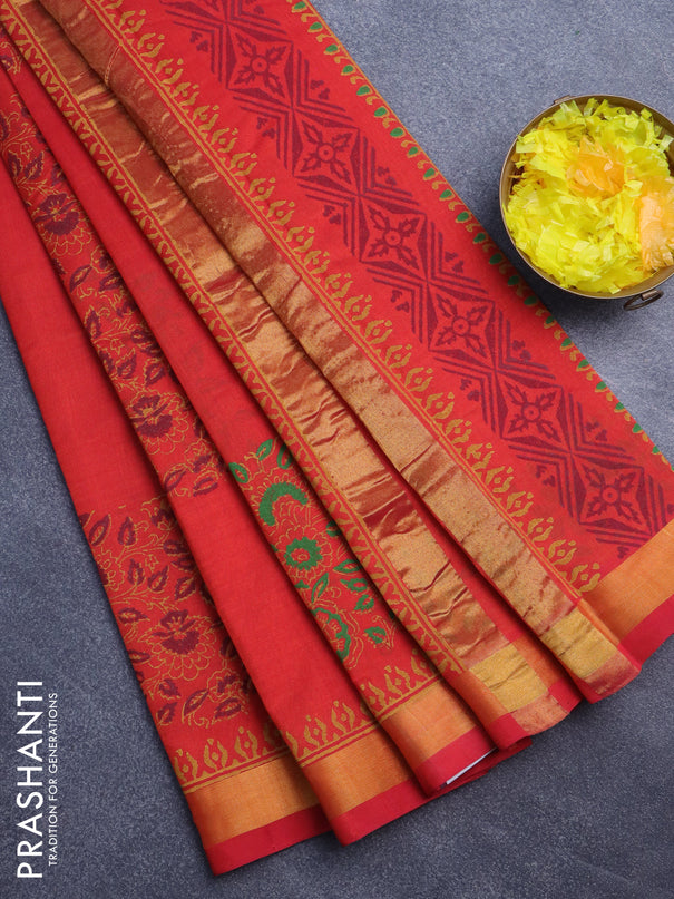 Silk cotton block printed saree reddish orange with allover prints and zari woven border