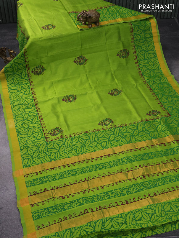 Silk cotton block printed saree light green with butta prints and zari woven border