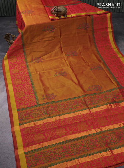 Silk cotton block printed saree dual shade of dark mustard with floral butta prints and zari woven border