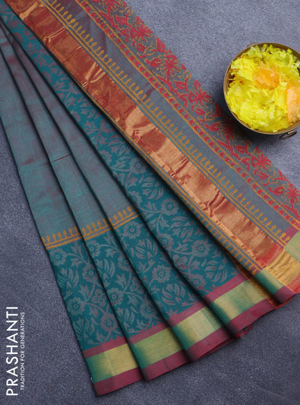 Silk cotton block printed saree dual shade of teal green and maroon shade with floral butta prints and zari woven border