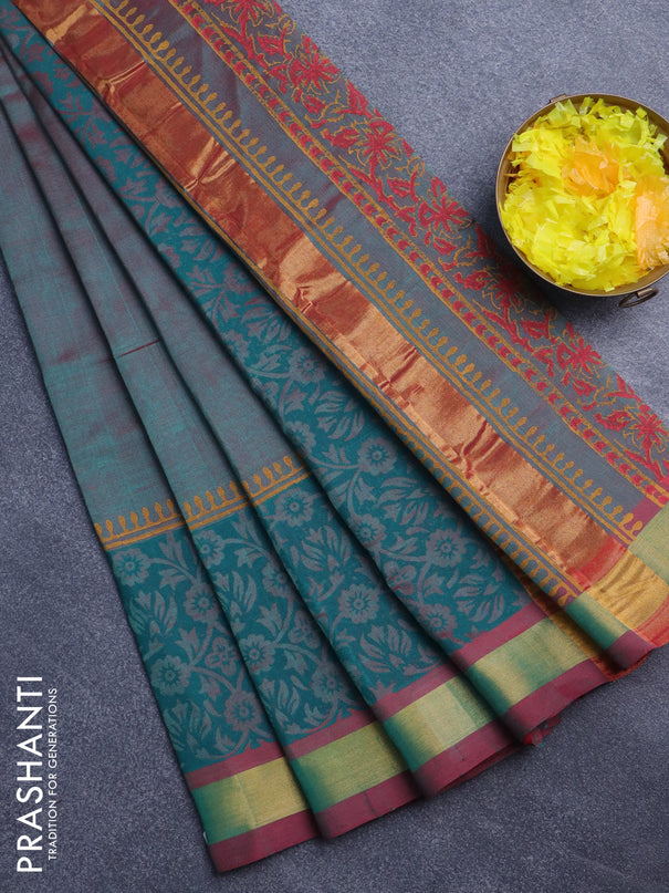 Silk cotton block printed saree dual shade of teal green and maroon shade with floral butta prints and zari woven border