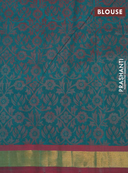 Silk cotton block printed saree dual shade of teal green and maroon shade with floral butta prints and zari woven border