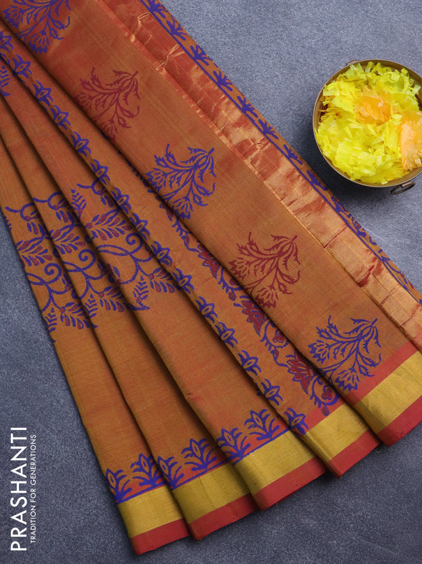 Silk cotton block printed saree dual shade of dark mustard with allover prints and zari woven border