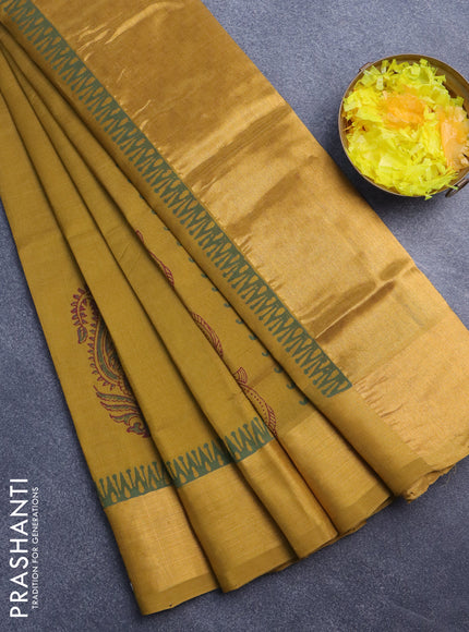 Silk cotton block printed saree dark mustard with paisley butta prints and zari woven border