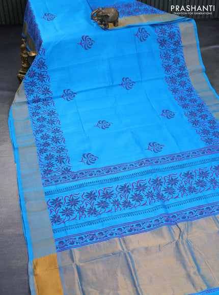 Silk cotton block printed saree cs blue with floral butta prints and zari woven border