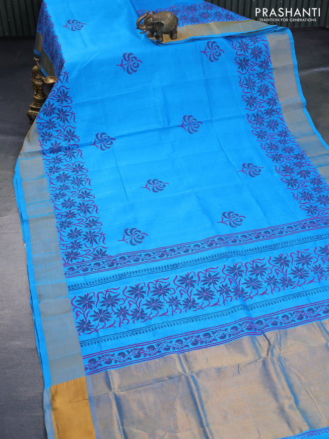 Silk cotton block printed saree cs blue with floral butta prints and zari woven border