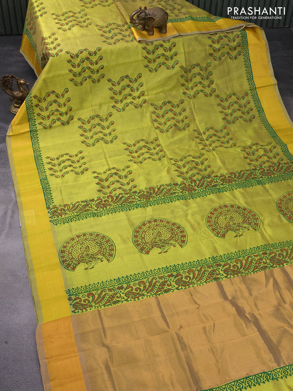 Silk cotton block printed saree lime green shade with allover prints and zari woven border