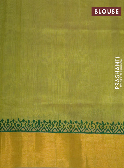 Silk cotton block printed saree lime green shade with allover prints and zari woven border