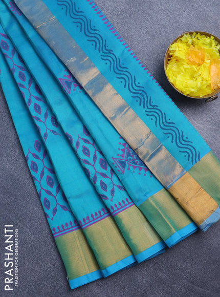 Silk cotton block printed saree dual shade of teal blue with allover prints and zari woven border