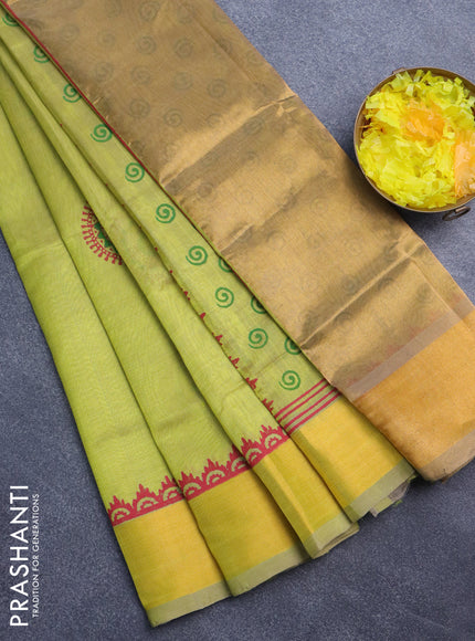 Silk cotton block printed saree lime yellow shade with butta prints and zari woven border