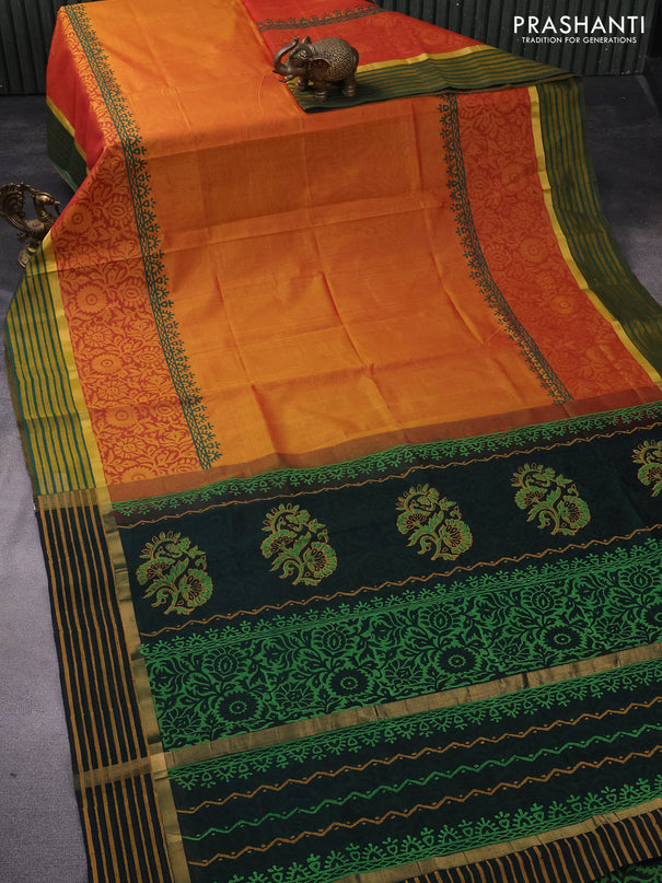 Silk cotton block printed saree dual shade of mustard and bottle green with prints and zari woven printed border