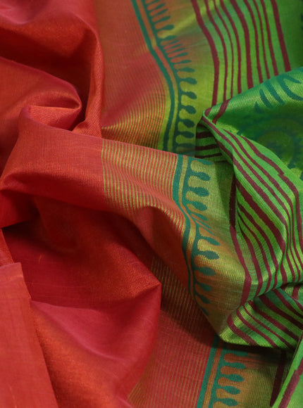 Silk cotton block printed saree rust shade and light green with prints and zari woven printed border