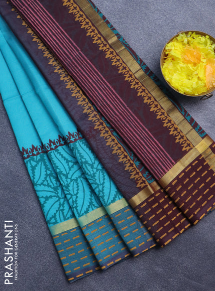 Silk cotton block printed saree teal blue and coffee brown with prints and zari woven printed border