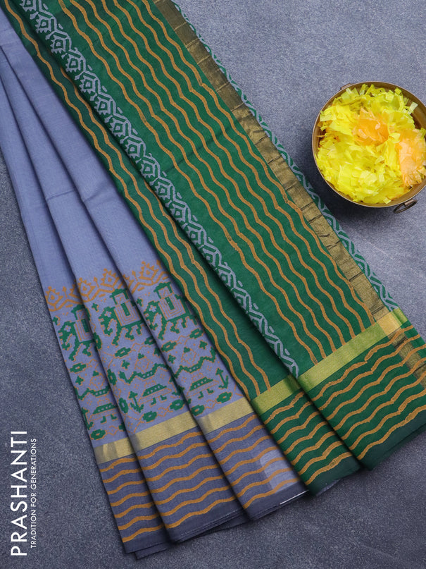 Silk cotton block printed saree grey and green with patola prints and zari woven printed border