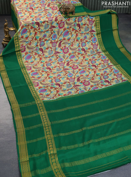 Pure mysore silk saree pale yellow and green with allover kalamkari digital prints and long rettapet zari woven border