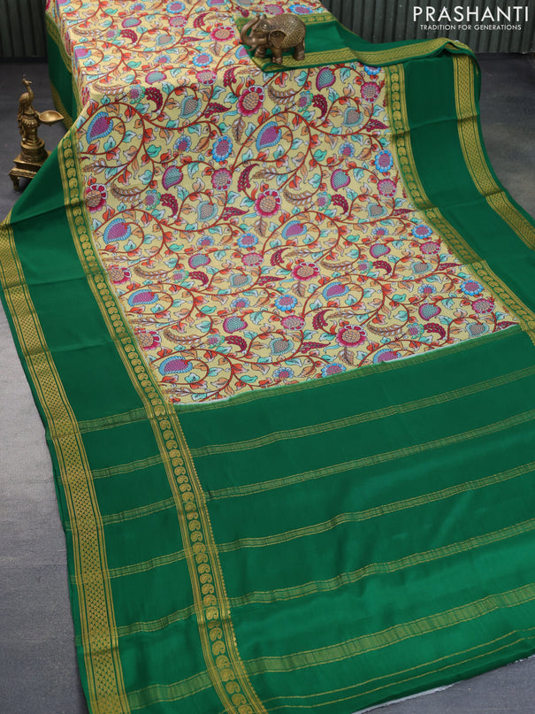 Pure mysore silk saree pale yellow and green with allover kalamkari digital prints and long rettapet zari woven border