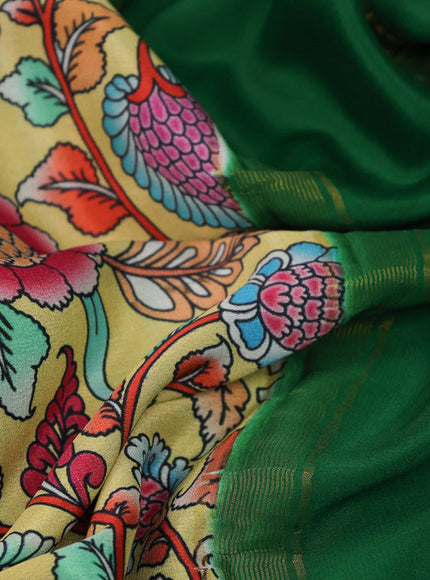 Pure mysore silk saree pale yellow and green with allover kalamkari digital prints and long rettapet zari woven border