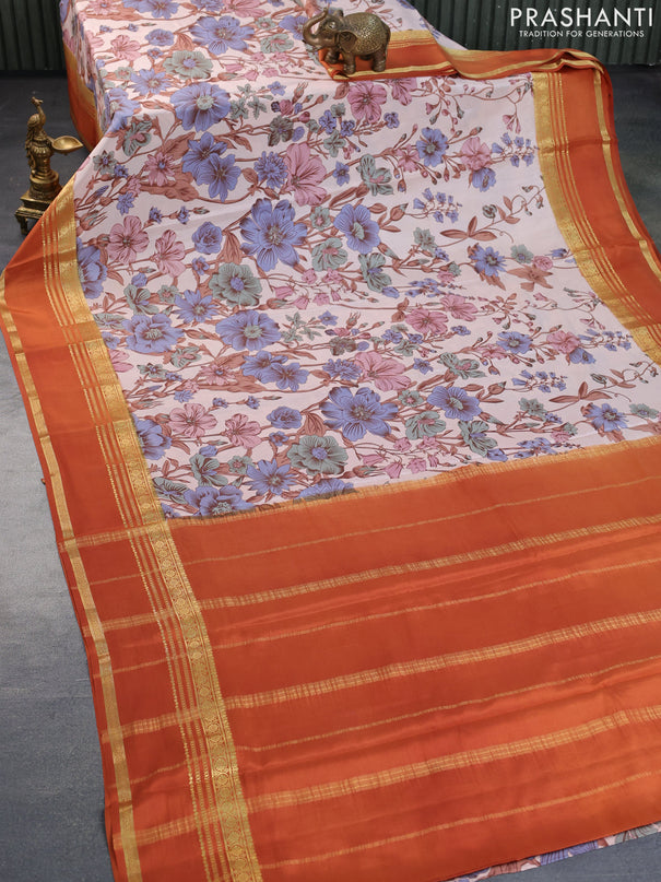 Pure mysore silk saree pastel shade and rustic orange with allover floral digital prints and rettapet zari woven border