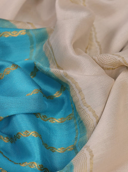 Pure mysore silk saree light blue and cream with allover zari strips pattern and long kalamkari digital printed border