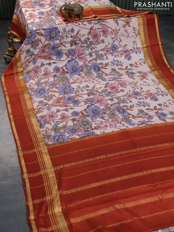 Pure mysore silk saree mild peach shade and rustic orange with allover floral digital prints and rettapet zari woven border