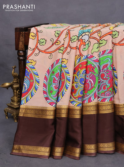 Pure mysore silk saree sandal and brown with allover kalamkari digital prints and long rettapet zari woven border