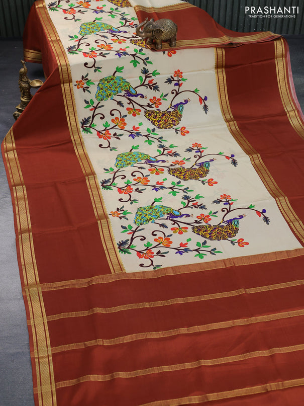 Pure mysore silk saree cream and rust shade with allover kalamkari digital prints and long rettapet zari woven border