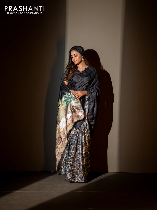 Semi tussar partly saree black with thread woven buttas & ajrakh prints and lace work border & pichwai printed pallu